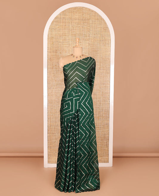 Borderless green zig-zag stripes gold foil printed, scallop-edged rangoli chiffon saree with a matching bandhani dotted blouse