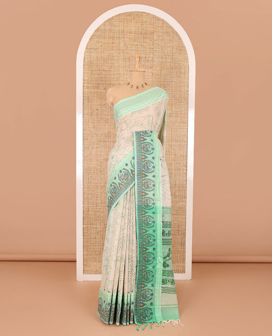 Chikku-green floral, and dear motifs printed mangalagiri cotton saree, contrast resham thread traditional temple  border of Madhubani floral-peacock print, printed pallu, and a contrast blouse