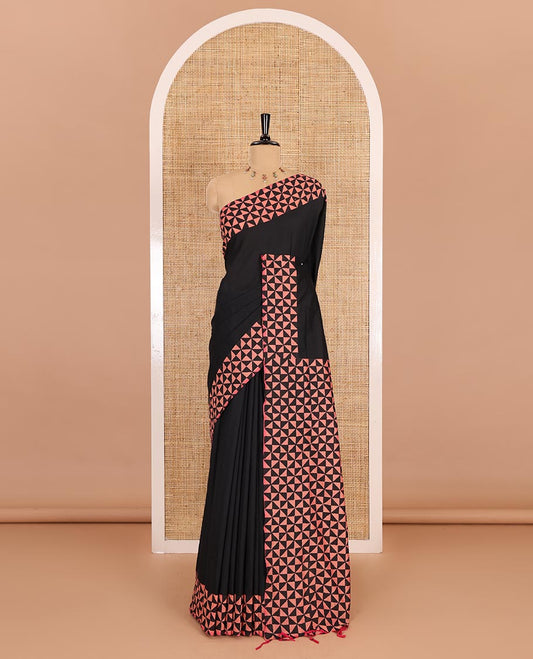 Black plain South cotton saree, triangle grid block printed border, block printed pallu, and a block printed blouse