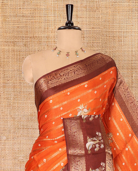 Rust orange bandhani dots, peacock buttas, and zari design dola silk saree, contrast traditional zari border of peacock motifs, and pallu of peacock print, and contrast blouse