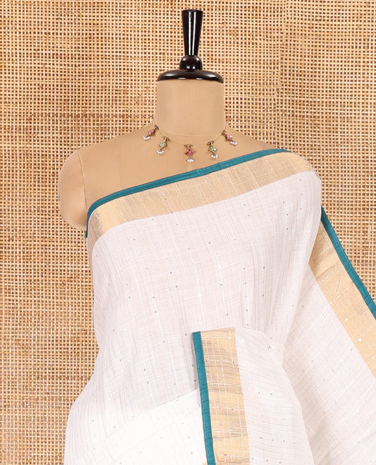 White and rama sequins striped Linen cotton saree, contrast zari sequins striped border, striped pallu, and a contrast plain blouse