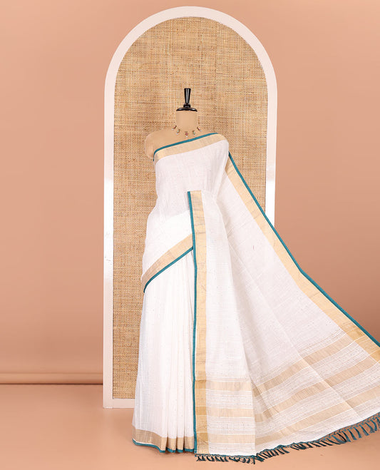 White and rama sequins striped Linen cotton saree, contrast zari sequins striped border, striped pallu, and a contrast plain blouse