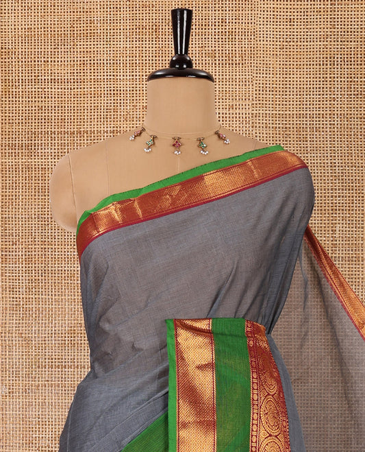 Grey plain Chettinad cotton saree, contrast traditional zari rettai pettu border, striped pallu, and a matching blouse
