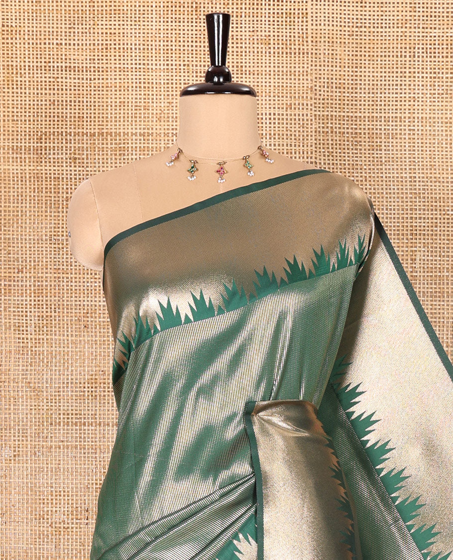 Green Elite Soft Silk Saree Gleamed Up with Vaira Oosi Stripes, Featuring a Temple Zari Border, Zari Elevated Pallu, and a Matching Zari Design Blouse