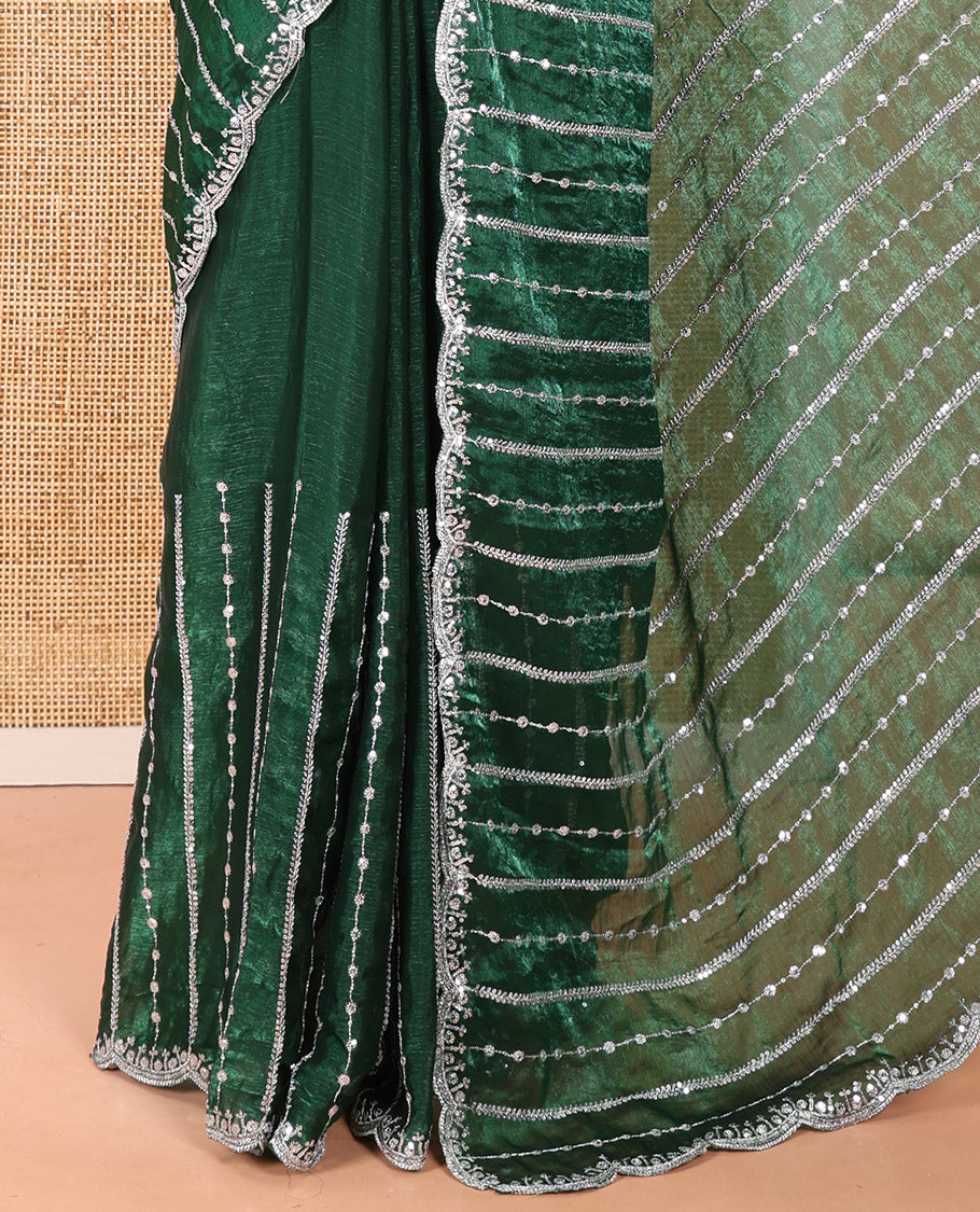 Green Fendy Chiffon Saree Highlighted with Sequins and Thread Stripes Embroidery, Scallop Embroidered Border, Elegantly Embroidered Pallu, and Paired with a Matching Blouse