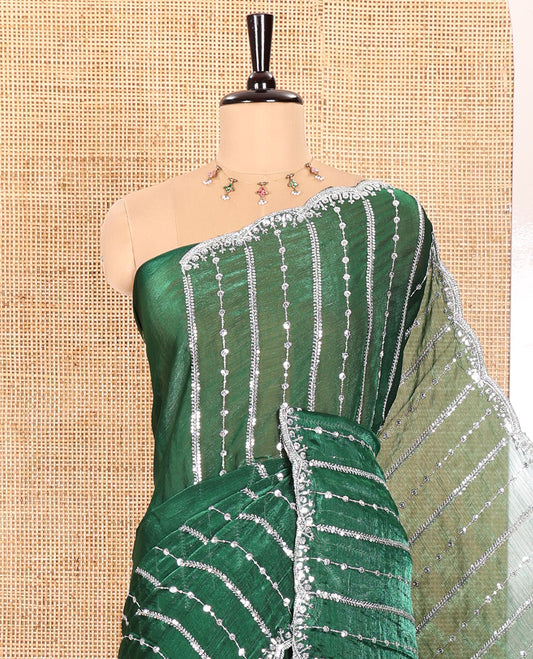 Green Fendy Chiffon Saree Highlighted with Sequins and Thread Stripes Embroidery, Scallop Embroidered Border, Elegantly Embroidered Pallu, and Paired with a Matching Blouse