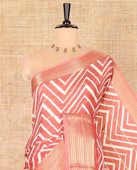 Rust Moss Chiffon Saree Accentuated with Horizontal Stripes and Zig-Zag Stripes All Over Its Body, Highlighted by Traditional Zari Design Border, Pallu Depicts Butta Enclosed Checks, and Paired with a Matching Blouse