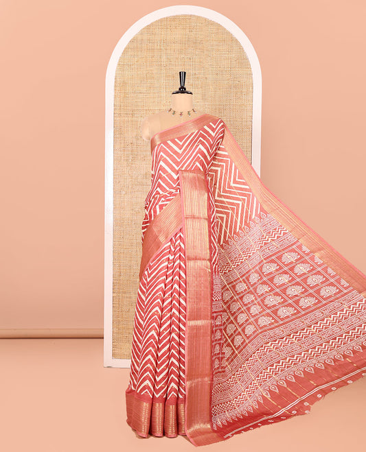 Rust Moss Chiffon Saree Accentuated with Horizontal Stripes and Zig-Zag Stripes All Over Its Body, Highlighted by Traditional Zari Design Border, Pallu Depicts Butta Enclosed Checks, and Paired with a Matching Blouse