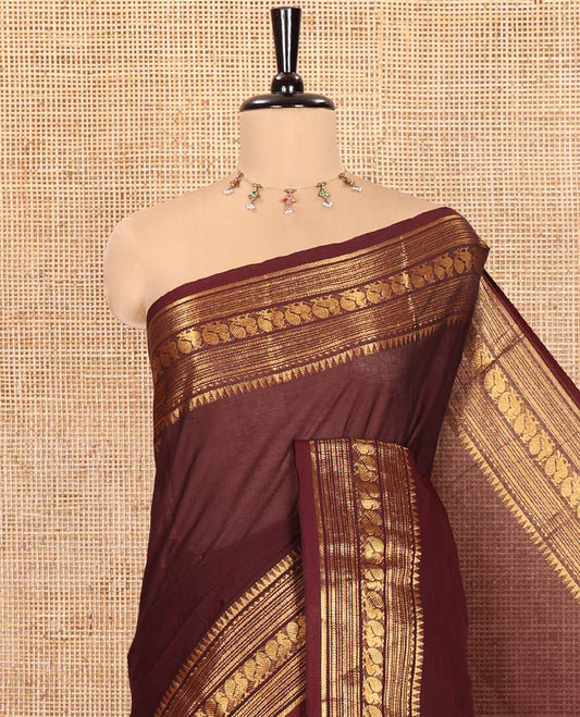 Coffee Brown Plain Chettinad Cotton Saree, Highlighted by a Temple Traditional Zari Border of Peacock Designs, Striped Pallu, and Paired with a Matching Blouse