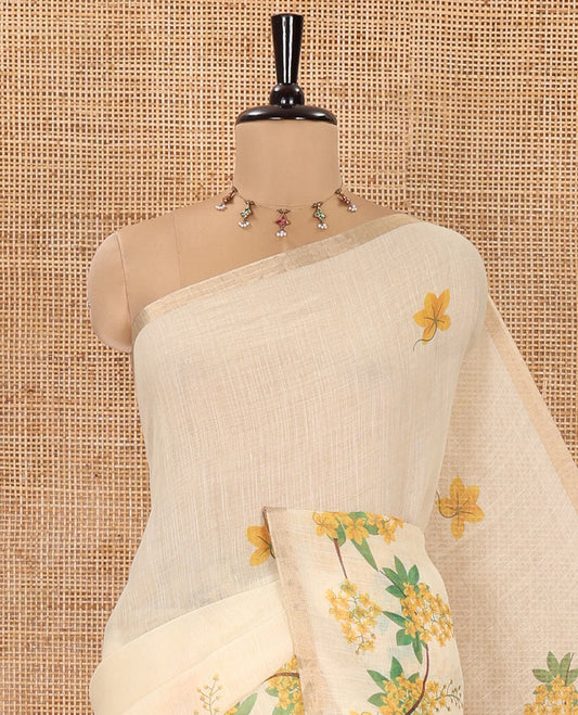 Cream Linen Saree, Elegantly Printed with Averrhoa Carambola-Style Floral Motifs, Subtle Piping Border, Pallu Mirrors the Same Print, and Paired with a Matching Blouse