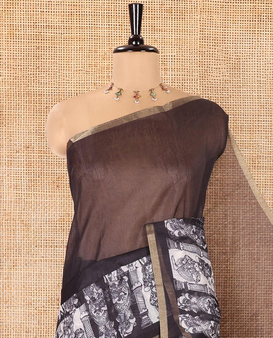 Black Chanderi Cotton Saree, Detailed with Kalamkari-Style Ancient Human Figurines Printed on Its Body, Subtle Zari Piping Border, Pallu Depicting Kalamkari Peacocks, and Paired with a Matching Blouse