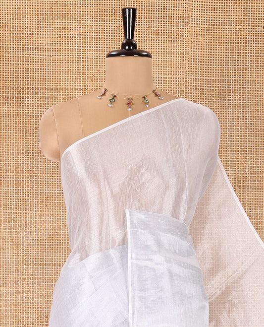 Borderless Silver Plain Khadi Tissue Saree, a Self-Pallu, and Paired with a Matching Blouse
