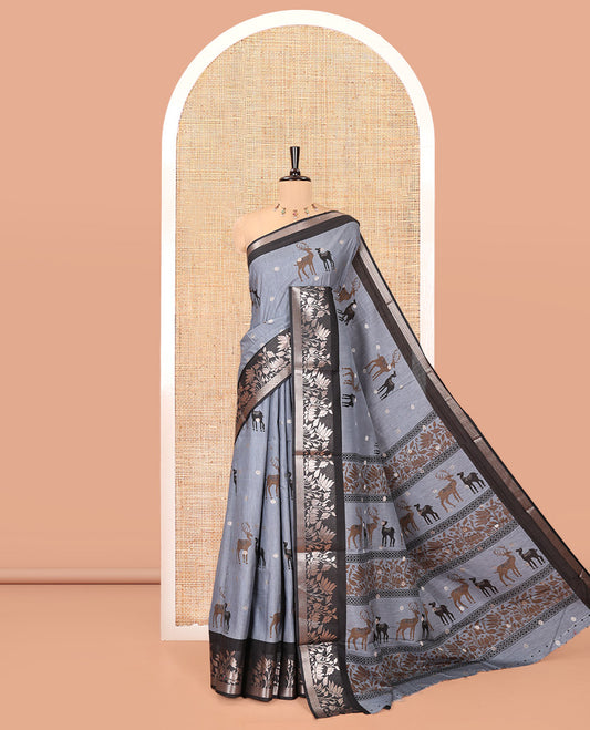 Grey Semi-Tussar Saree, Adorned with Round Buttas and Deer Buttas All Over Its Body, Highlighted by a Zari Border of Pichwai Lotus Design, Pallu of Lotus and Deer Motifs, and Paired with a Matching Blouse