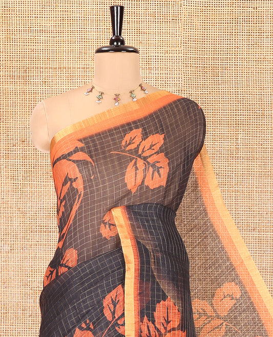 Black and Orange Linen Cotton Saree, Adorned with Floral Motifs and Checked Design on Its Body, Complemented by a Contrast Border, Pallu of Kalamkari Floral and Peacock Design, and Paired with a Contrast Blouse