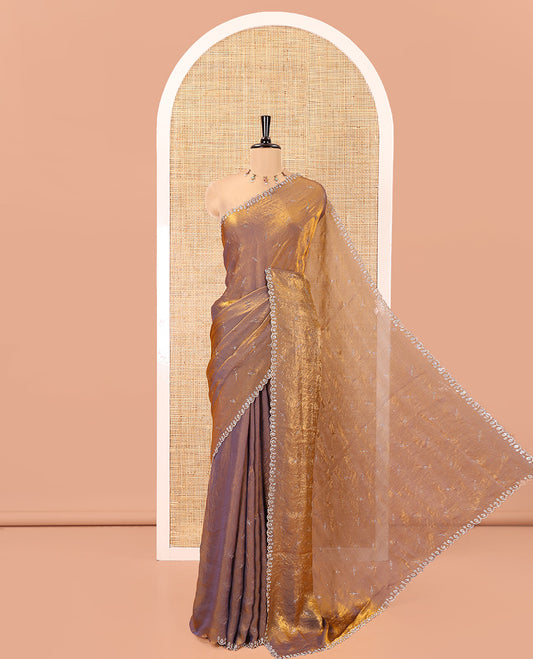 Brown Fendy Chiffon Saree, Highlighted by Swarovski Stone Work All Over the Body, Gleaming Swarovski Stone Work Border, a Self-Pallu, and Paired with a Fancy Designer Blouse