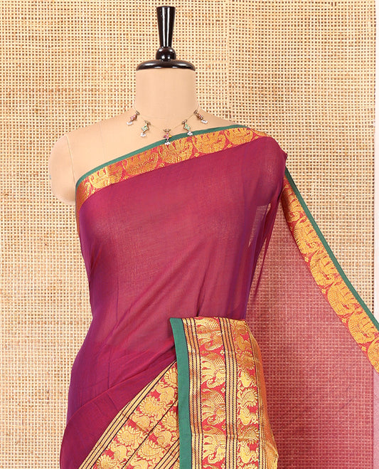 Purple Plain Mercerised Cotton Saree, Complemented by a Contrast Traditional Border of Peacock, Elephant, and Peacock Eye Designs, Striped Pallu, and Paired with a Matching Blouse