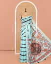 Sea Green Linen Cotton Saree, Adorned with Shibori Print, a Zari Piping Border, Floral-Peacock Motif Printed Pallu, and Matching Blouse