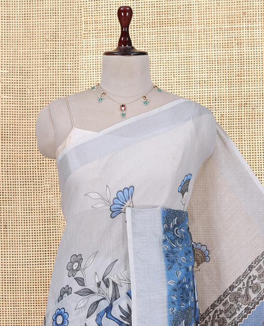 Light Chikku Linen Cotton Saree, Adorned with Flora-Fauna Print, a Zari Border, Musical Instruments Printed Pallu, and a Matching Blouse