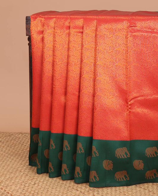 Red copper zari design litchi soft silk saree with contrast elephant, annam zari design border & rich pallu along with brocade blouse