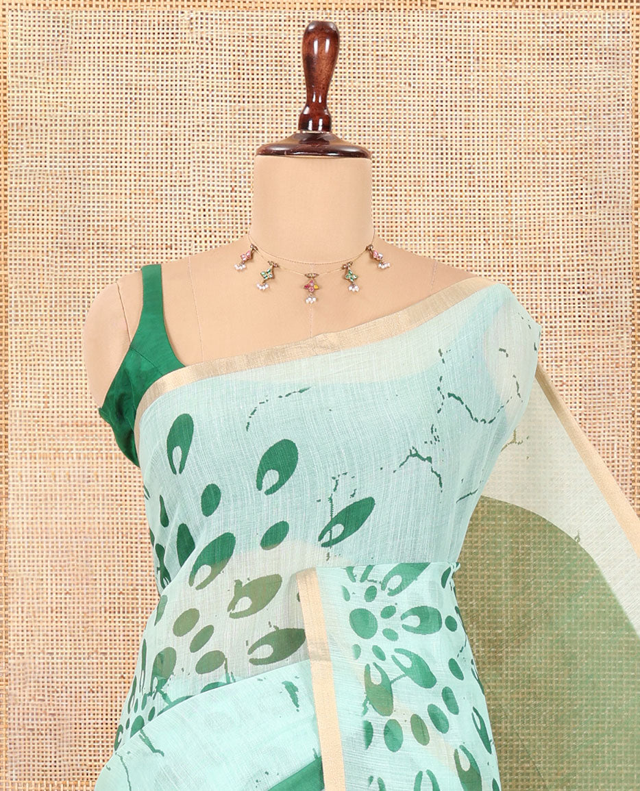 Borderless Rama Green Linen Cotton Saree, Elevated with Geometric-Abstract Print and a Contrast Blouse