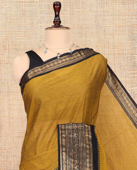 Mustard Plain Chettinad Cotton Saree, a Contrast Traditional Zari Temple Border, Striped Pallu, a Matching Blouse