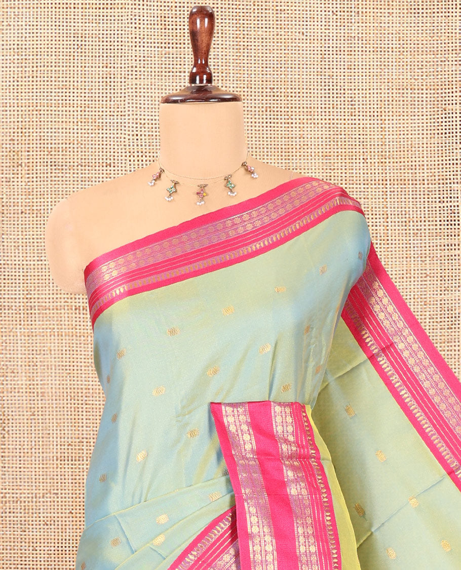 Rama Softy Silk Saree, Adorned with Zari Buttas, a Contrast Traditional Zari Border, and a Matching Blouse