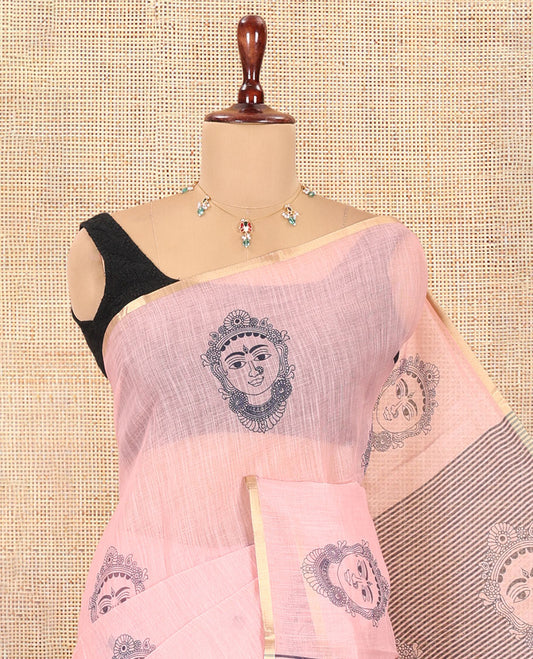 Borderless Peach Linen Cotton Saree, Elevated with Face Print, Contrast Pallu of Chevron Stripes and Face Print, a Contrast Blouse