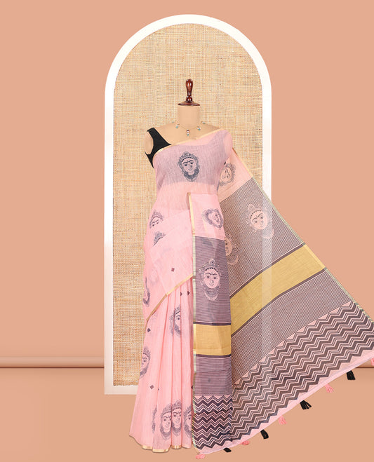 Borderless Peach Linen Cotton Saree, Elevated with Face Print, Contrast Pallu of Chevron Stripes and Face Print, a Contrast Blouse