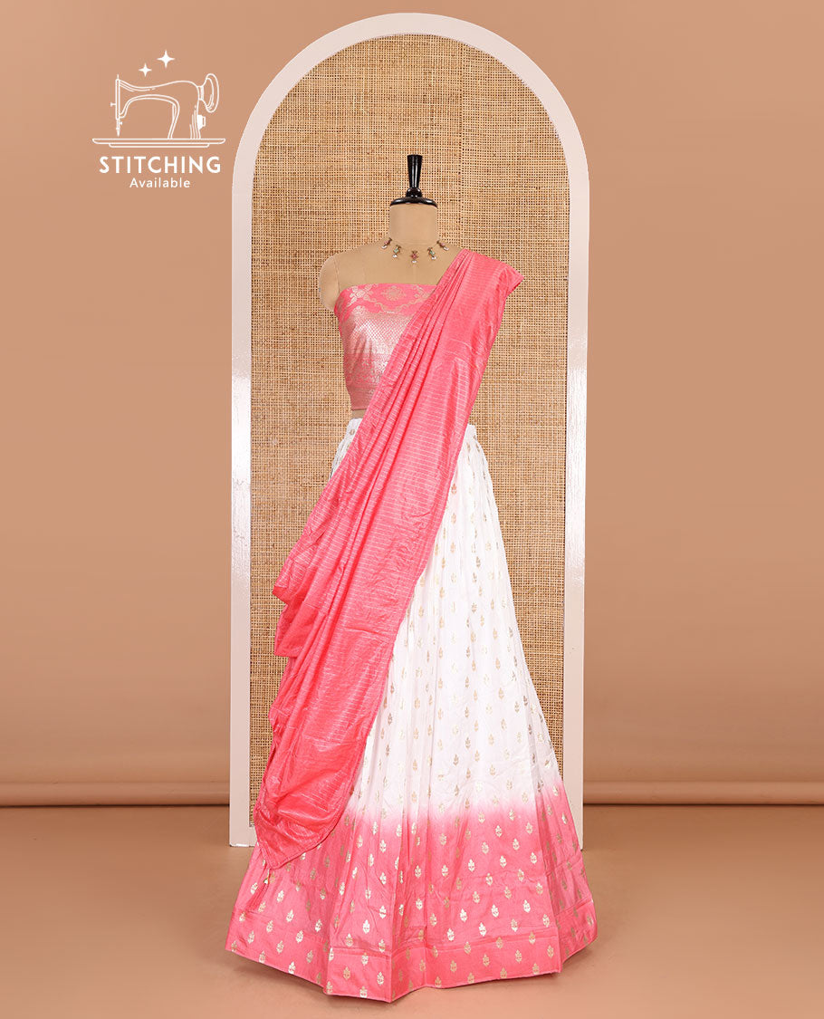 White-peach half-saree, zari buttas with contrast bordered nylon viscose crepe skirt, a jaal jacquard design Vichitra silk blouse, and a contrast striped Vichitra silk dhavani