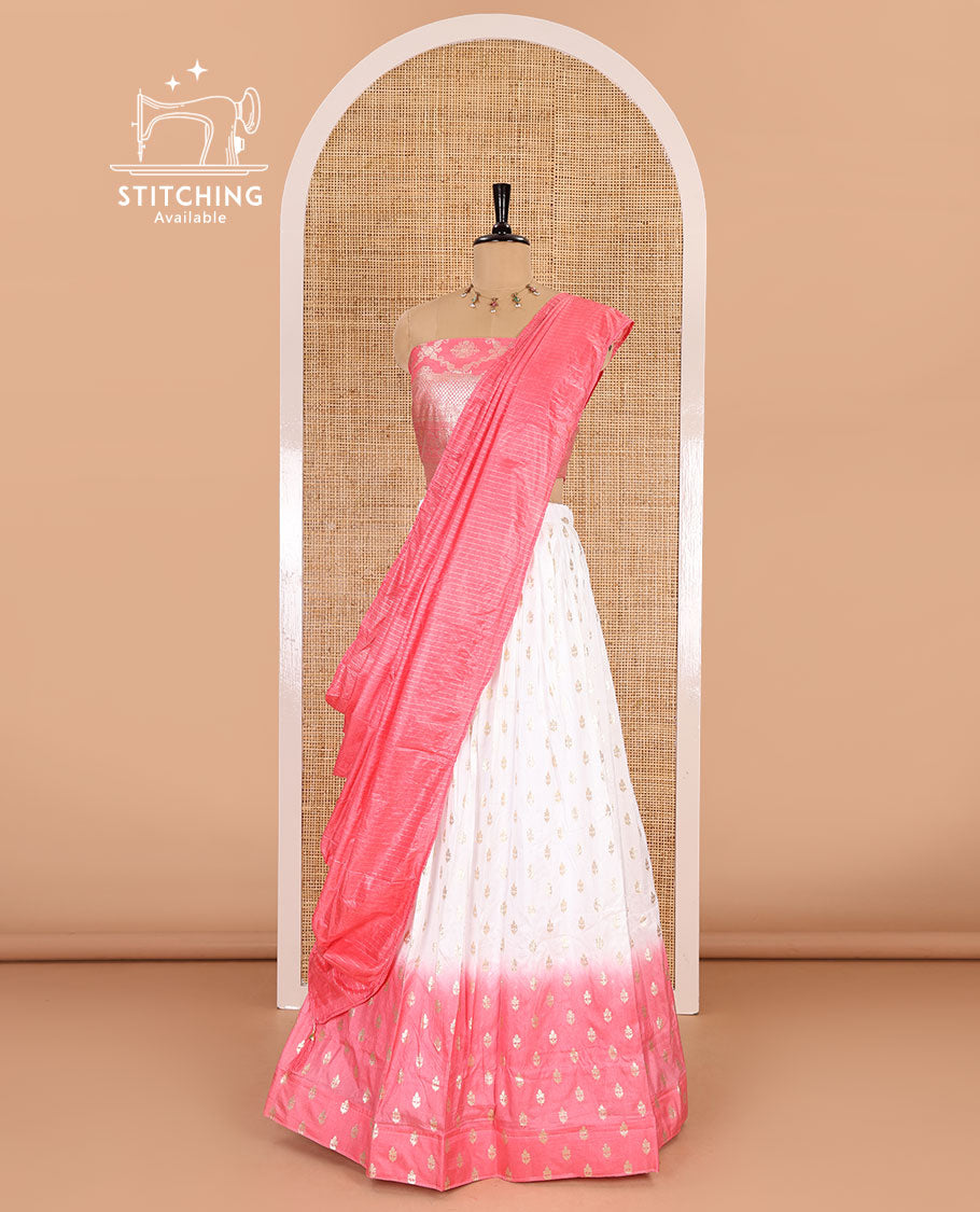 White-peach half-saree, zari buttas with contrast bordered nylon viscose crepe skirt, a jaal jacquard design Vichitra silk blouse, and a contrast striped Vichitra silk dhavani