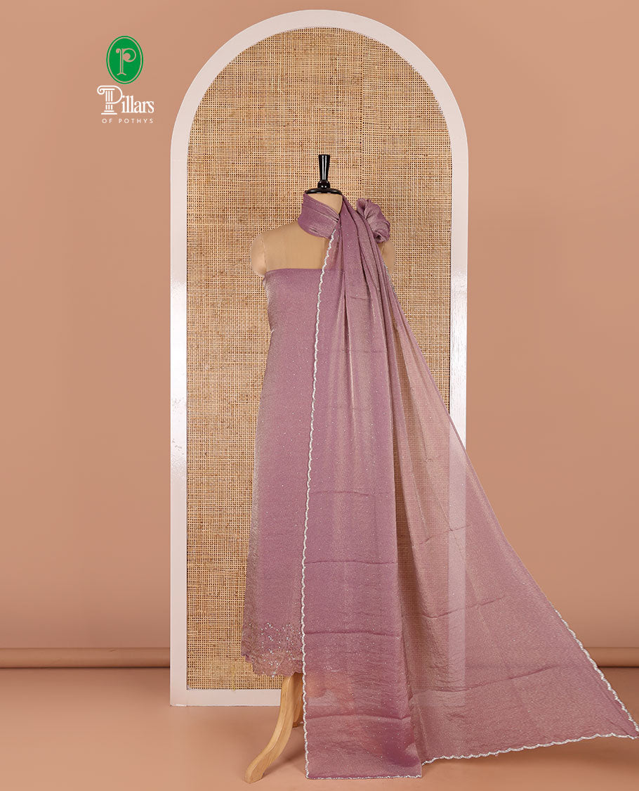 Lavender material chudidar set, stone work moss organza top, a matching bottom, and scallop stone work moss organza dupatta