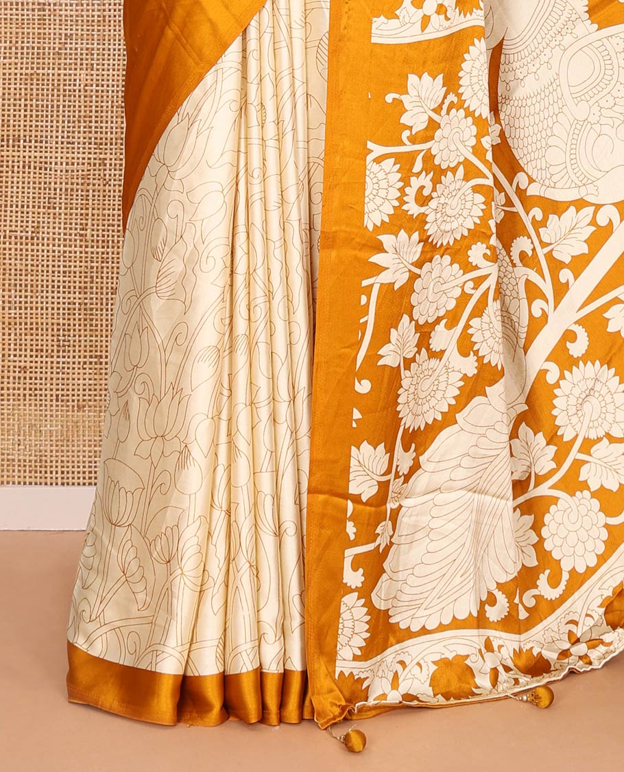 Chikku-mustard half-and-half plain and kalamkari floral printed satin crepe saree, plain border, pallu of floral vine and peacock printed, and kalamkari floral printed blouse