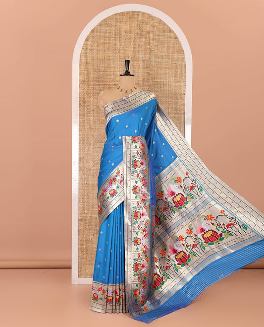 Rama blue floral buttas art silk paithani saree, contrast floral, bird, and muniya border, pallu of floral and bird designs and a matching blouse