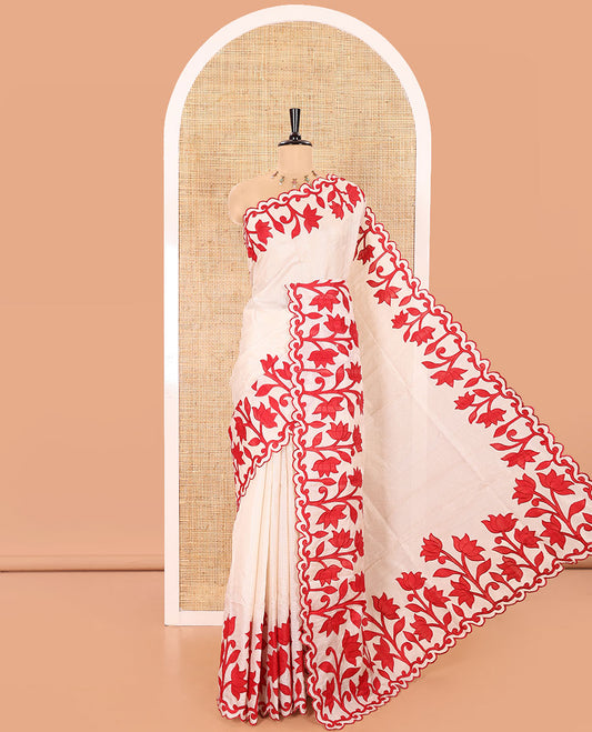 Cream and Red Plain Fancy Kota Silk Saree Simply Sparkled with Lotus Floral Applique Embroidered Scallop Border, Lotus Motifs Applique Embroidered Pallu, and a Contrast Plain Blouse