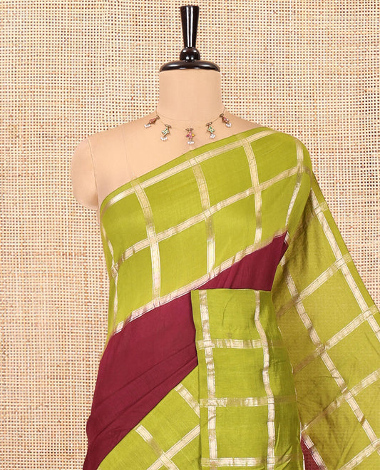 Wine Plain Assam Silk Saree, Complemented by Gharchola Checked Border, Gleaming Zari Striped Pallu, and Paired with a Contrast Blouse