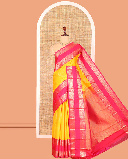 Yellow-Pink Budget Silk Saree, Accentuated with Zari Stripes, Contrast Rettai Pettu Peacock Border, Grand Pallu, and a Contrast Blouse