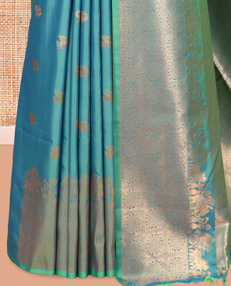 Peacock Blue Soft Silk Saree, Ornamented with Horse-Peacock Buttas, a Zari Border, Jaal Pallu, and a Matching Blouse