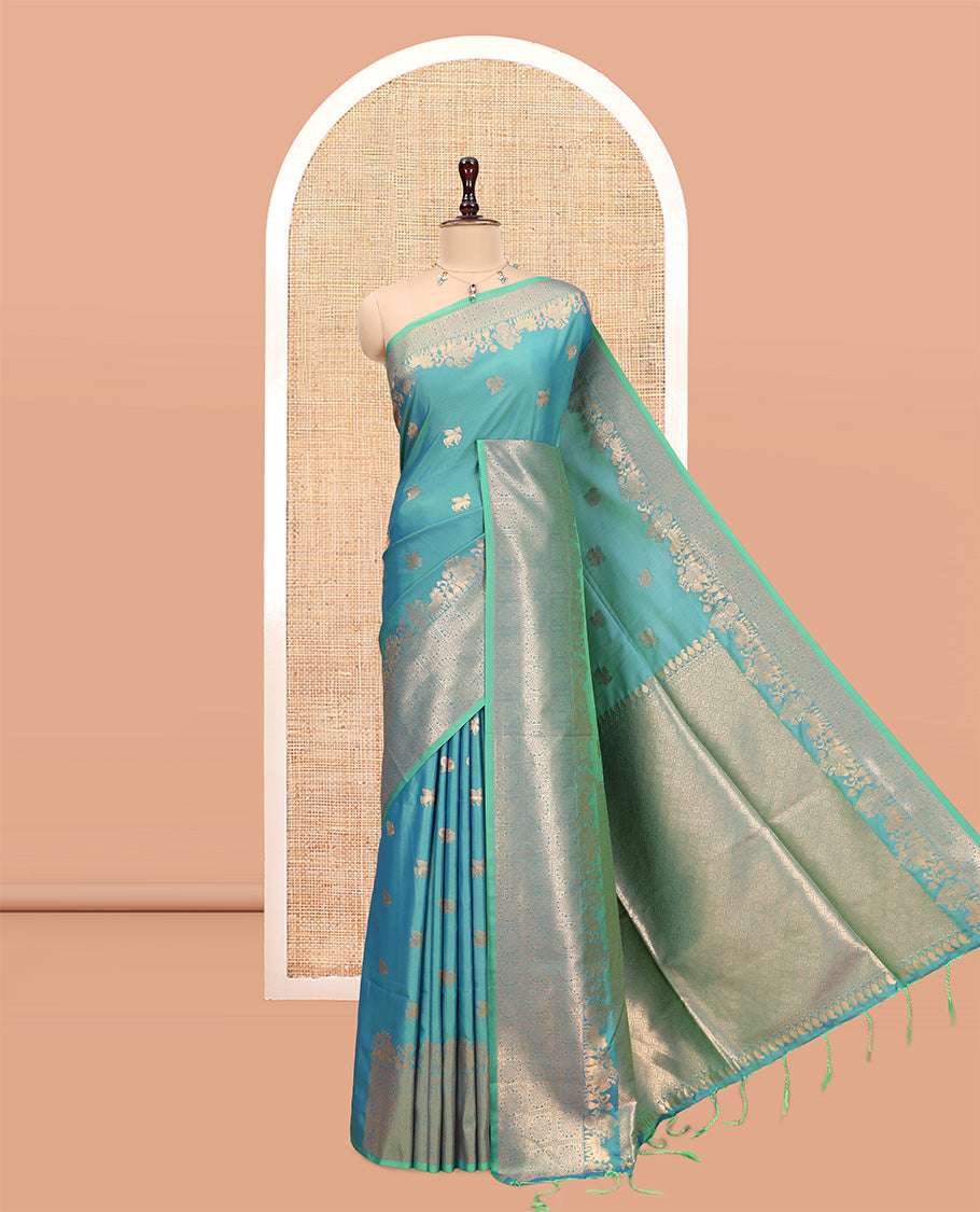 Peacock Blue Soft Silk Saree, Ornamented with Horse-Peacock Buttas, a Zari Border, Jaal Pallu, and a Matching Blouse