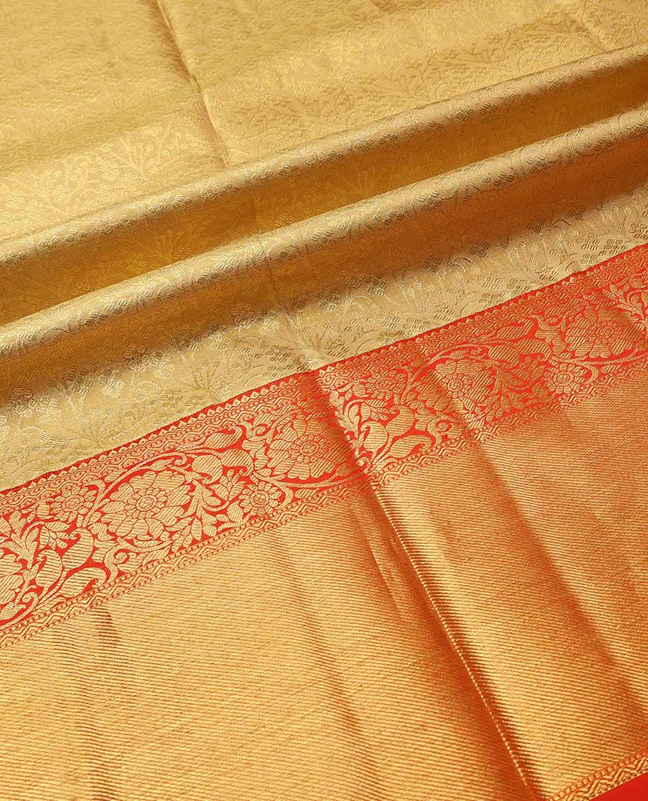 Gold pure-silk half saree, jacquard skirt, contrast border & blouse of rekku,muthu,neli & kodi visiry motifs & intricate dhavani