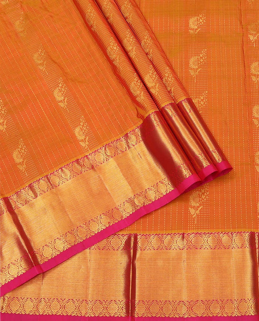Orange Pure Silk Half-Saree, Woven with Zari Designs All Over Its Skirt, Complemented by Contrast Laddu Kamalam Border, Paired with a Contrast Blouse, and Comes with a Floral Design Dhavani
