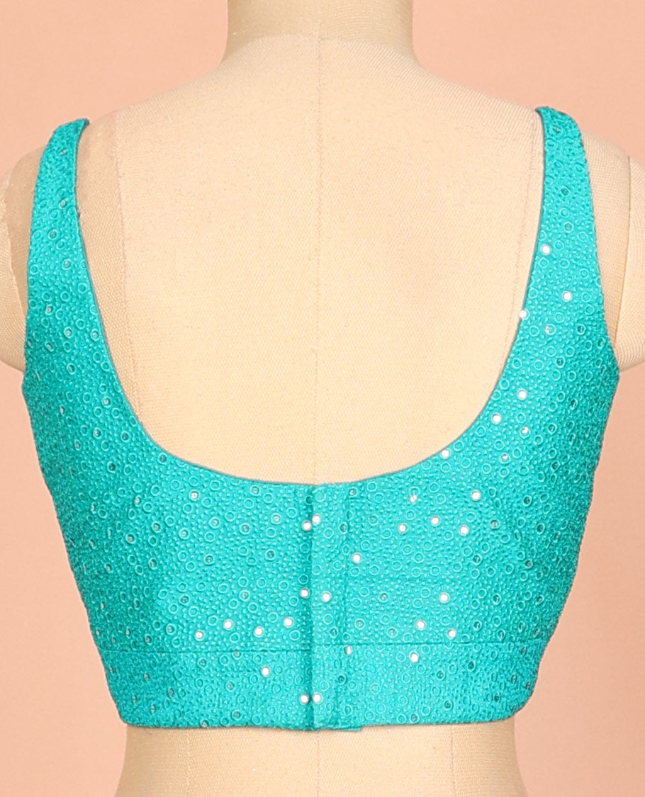 Turquoise embossed thread embroidery & sequins work sleeveless readymade blouse with deep-V front neck & round back neck