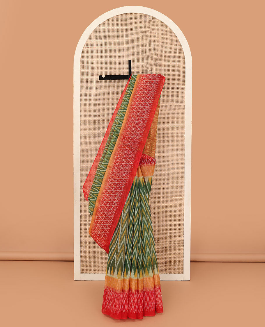 Green ikkat chevron design silk cotton saree, contrast zari bavanji border of ikkat jaal design, and pallu of jaal design