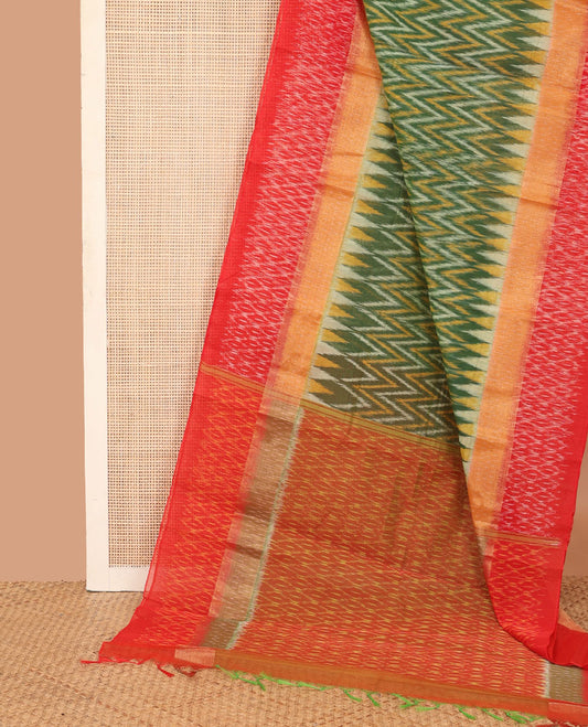 Green ikkat chevron design silk cotton saree, contrast zari bavanji border of ikkat jaal design, and pallu of jaal design