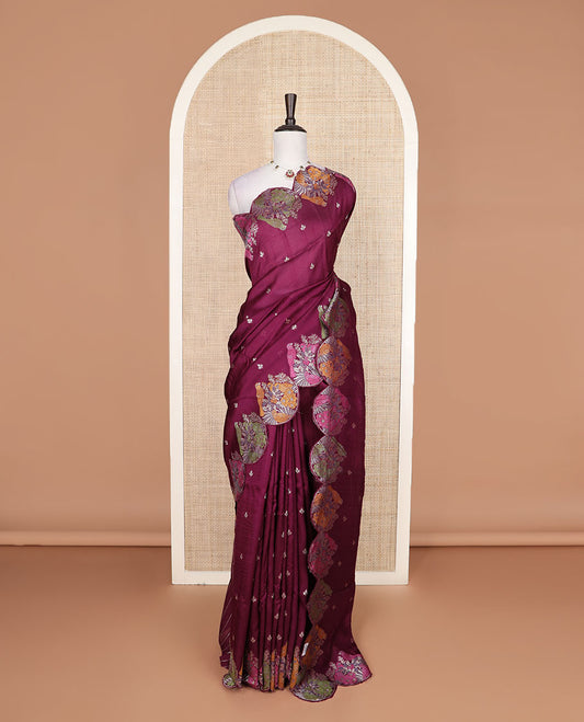 Wine Matka silk saree features rudraksham motifs, scallop floral motifs and bird embossed thread embroidery border