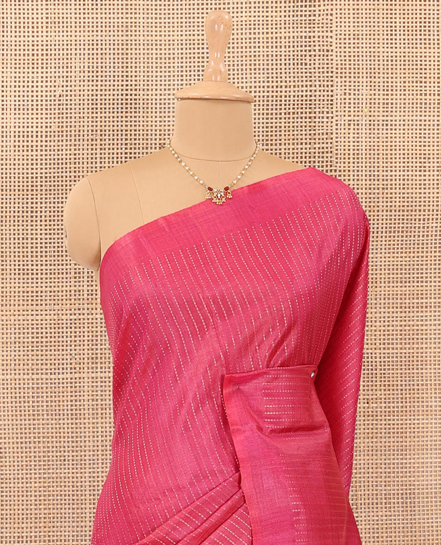 Pink tiny boxed motif stripes tussar silk saree, self-border, and gleaming zari pallu