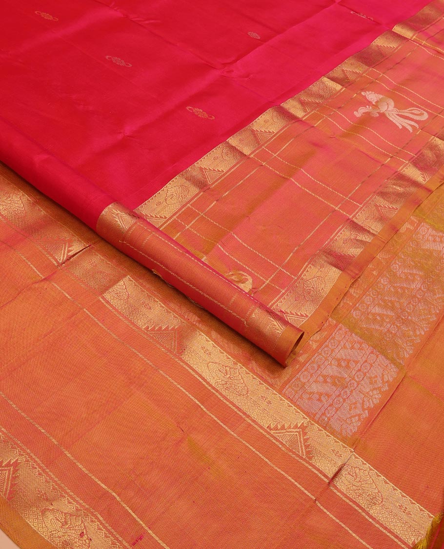 Red Uppada Silk Saree Elevated with Floral Buttas, Captivating Contrast Border of Traditional Zari Motifs and Peacock Motifs, Pallu Depicting Floral Jaal Design, and Paired with a Contrast Zari-Bordered Blouse