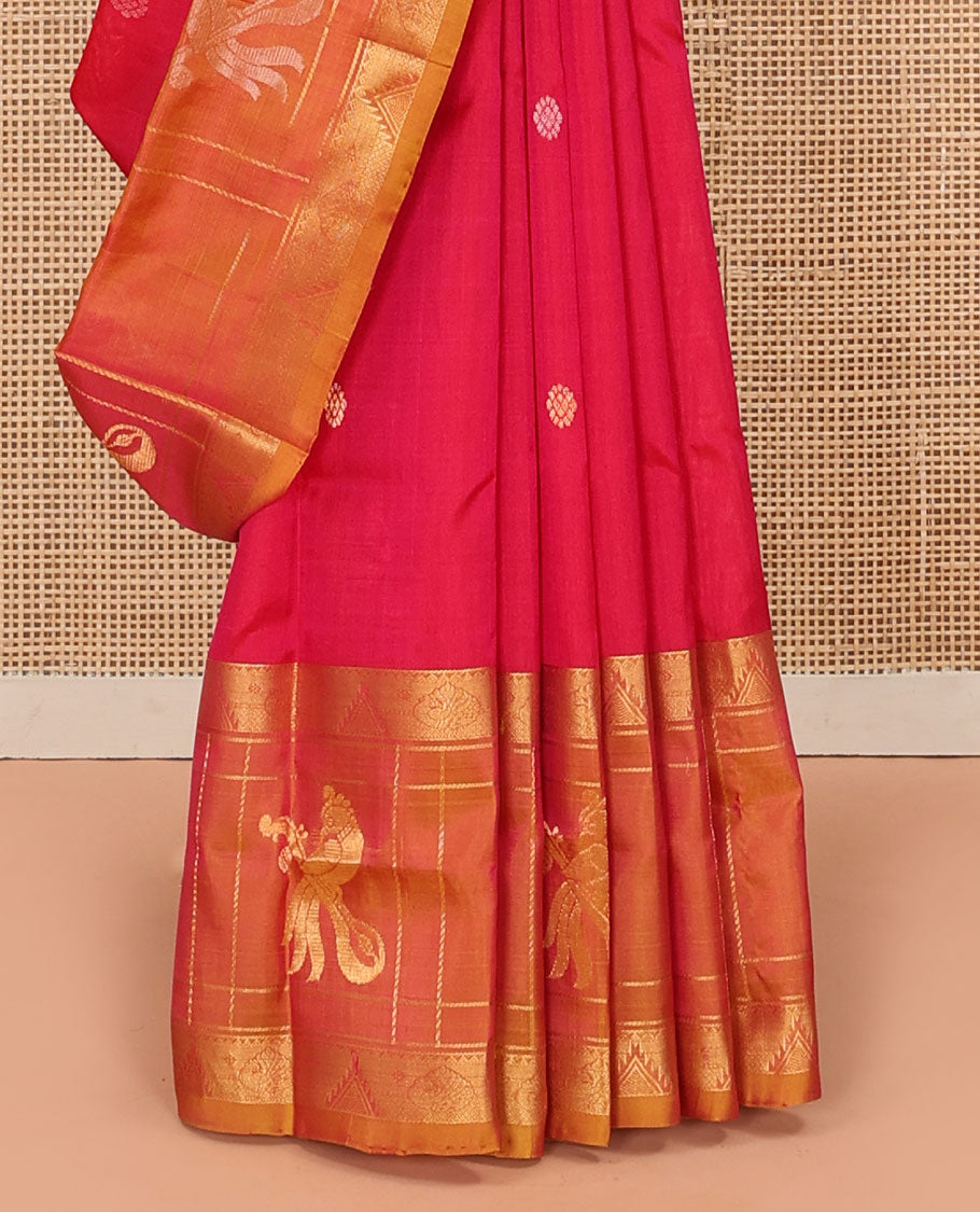 Red Uppada Silk Saree Elevated with Floral Buttas, Captivating Contrast Border of Traditional Zari Motifs and Peacock Motifs, Pallu Depicting Floral Jaal Design, and Paired with a Contrast Zari-Bordered Blouse