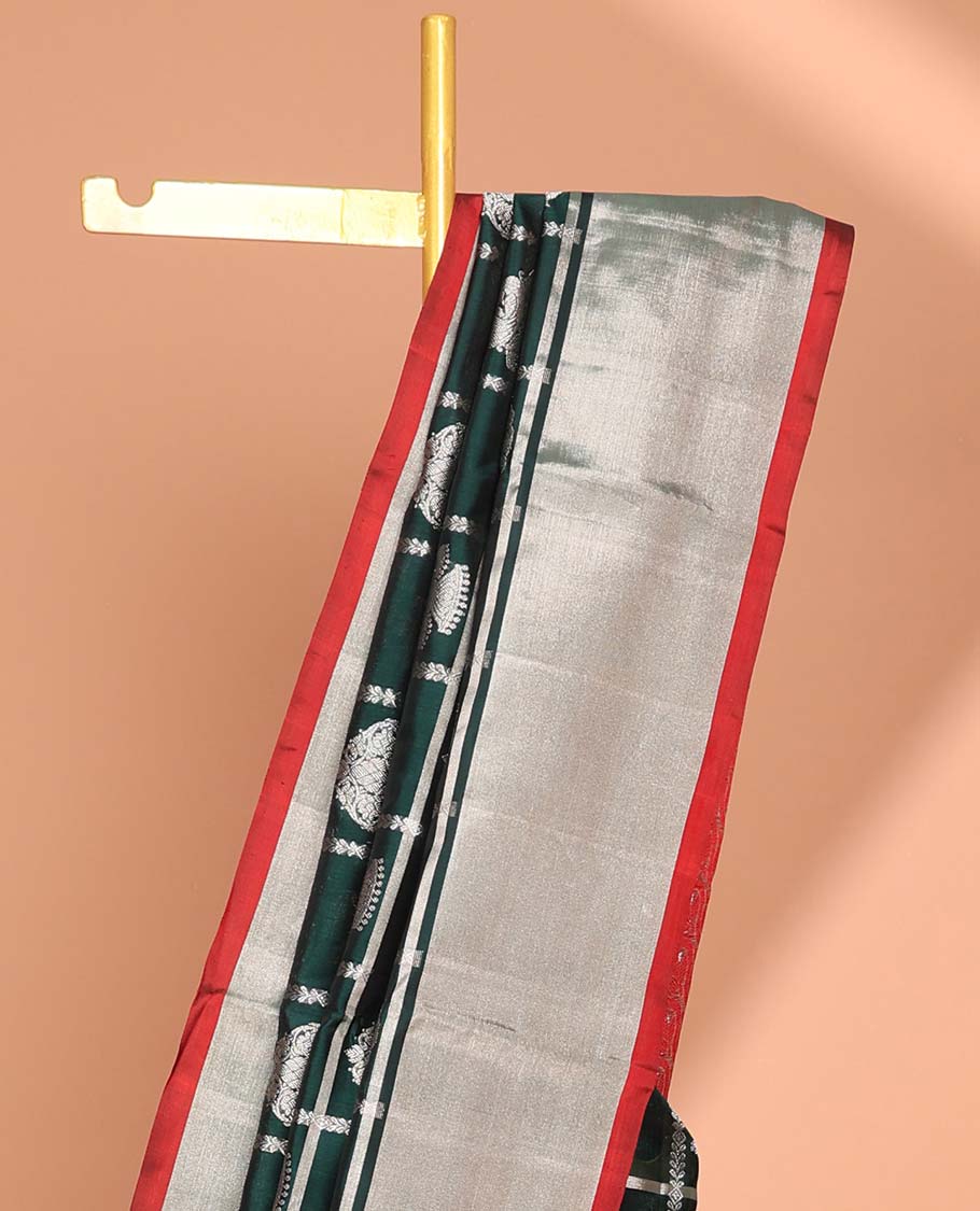 Green motifs enclosed with checked design vengatagiri pure silk saree , contrast bavanji border & pallu of ogee pattern