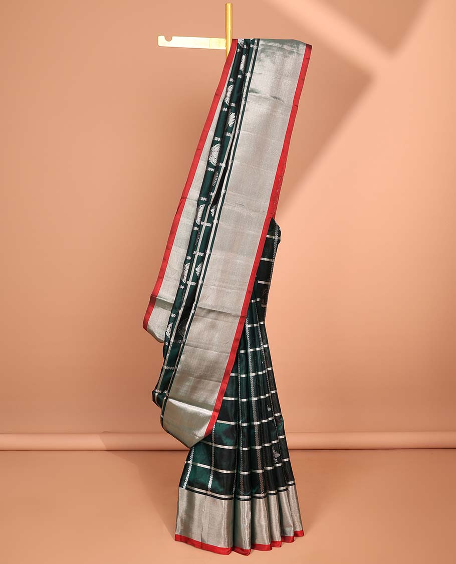Green motifs enclosed with checked design vengatagiri pure silk saree , contrast bavanji border & pallu of ogee pattern