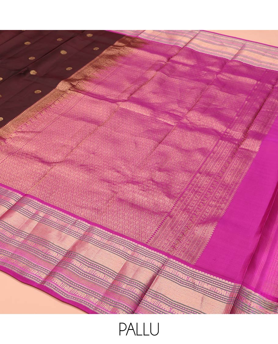 Brown Vasundhara Lite-Silk Mix Saree, Enriched with Zari Buttas on Its Body, Complemented by a Contrast Border of Thilakam Mokku, Mayil, Yaanai, and Mayil Kann Designs, Gleaming Zari Pallu of Jaal Designs, and Paired with a Contrast Blouse